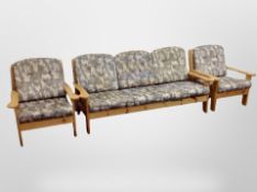 A three piece pine framed conservatory suite