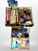 Three boxes of assorted puzzles,