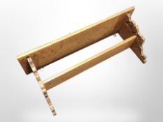 A carved oak wall shelf,