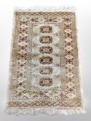 An Afghan Bokhara rug 102 cm x 64 cm