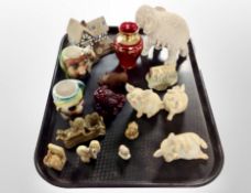 A group of resin and ceramic ornaments, animal figures, cottage ornaments,