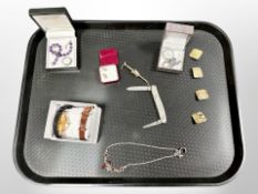 A penknife together with cabochon white metal necklace, vintage hand finished buttons,