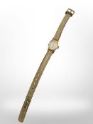 An 18ct yellow gold lady's wristwatch by MuDu.