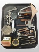 A group of Danish teak handled kitchen utensils including bottle opener, nut crackers, wine stopper,