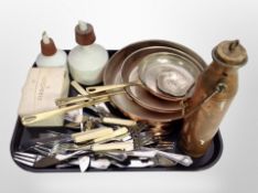 Two 19th century porcelain sieves, set of three graduated copper skillets with brass handles,