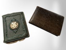 A Victorian photograph album containing antique photographs etc.