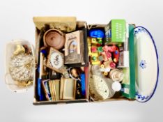 Two boxes of continental decorative wares, crystal drop light fitting, photograph frames,