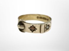 A 9ct yellow gold buckle ring, size O. CONDITION REPORT: 2.6g.