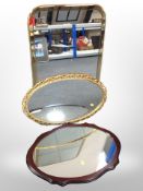 A brass framed mirror,