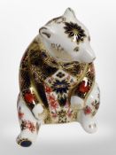 A Royal Crown Derby Seated bear paperweight with silver stopper