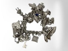 A silver charm bracelet 126.