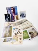 A group of assorted unframed pictures and prints, colour lithographs,