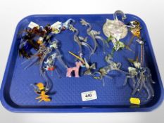 A group of coloured glass animal ornaments