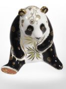 A Royal Crown Derby Giant panda paperweight with gold stopper
