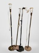 Four 20th century Continental brass and metal standard lamps