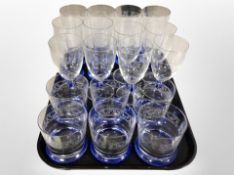 A suite of eighteen etched two-tone glasses and a matching jug