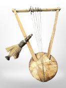 An Ethiopian stringed instrument together with a hardwood figure