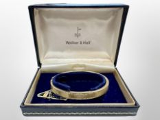 A 9ct yellow gold bangle, 60 mm x 55 mm internal diameter. CONDITION REPORT: 22.5g.