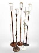 Five Scandinavian teak and metal standard lamps