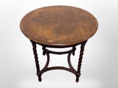 An oak barley twist occasional table,