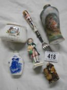 An interesting lot including perfume bottle, figures etc.,