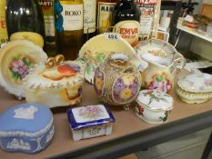 A mixed lot of ceramics including trinket boxes etc.,