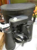 A cased pair of Boots Ascot binoculars.