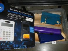 A box of assorted office items.