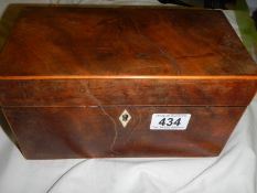 A Victorian tea caddy.