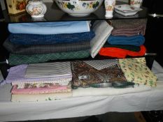 A good lot of vintage fabrics including a piece of leather.