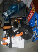 A Ryobi battery drill (no battery) and other tools.