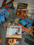 A quantity of How and Why magazines.