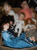 A box of good collector's dolls.