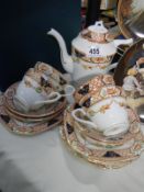 A part teaset with teapot.
