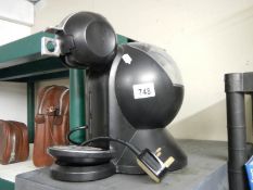 A Nescafe Dulce Gusto coffee machine.