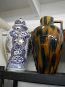 A large Oriental vase, a/f and one other.