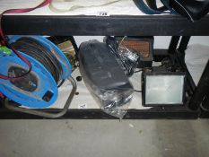 A pair of vintage speakers, two extension leads and a security light.