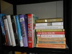 A quantity of hardback and paperback books.