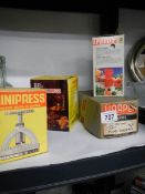 A boxed vintage Bel burger press, Speedy herb chopper etc.,