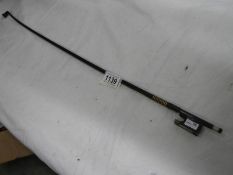 A violin bow stamped Corelli
