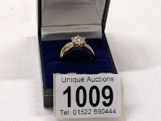 A 9ct gold ring set CZ?, size P, 3.2 grams.