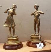 2 brass figures playing violin & flute on wooden bases