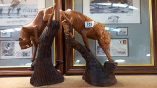 2 carved wooden leopards. 1 A/F