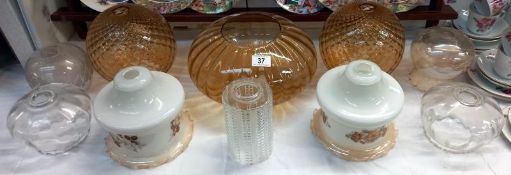 A good lot of vintage lampshades