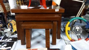 A heavy oak nest of tables COLLECT ONLY