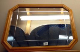 A pine framed mirror - 68cm x 52cm. COLLECT ONLY