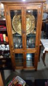 A modern glazed book case. COLLECT ONLY.