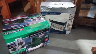 A boxed Parkside car polisher and boxed money coin sorter