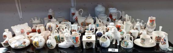 An assortment of crested ware