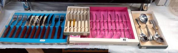 4 boxed lots of cutlery